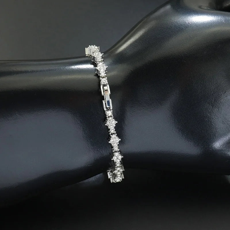 Iced Out Flower-Shaped Cross Tennis Bracelet