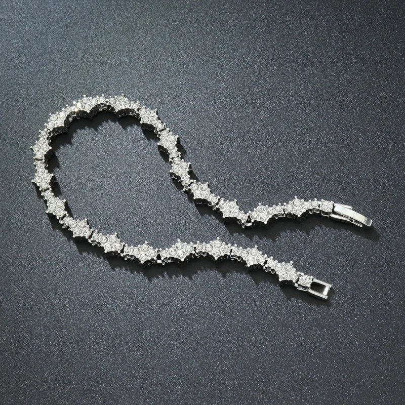 Iced Out Flower-Shaped Cross Tennis Bracelet